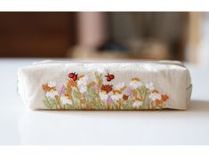 Hand Embroidered Pencil Case With Flower Embroidery, Pen Case, Floral Makeup Pouch, Flower Makeup Bag - Etsy White Rectangular Pouch With Pen Holders, White Pencil-shaped Pencil Case Gift, White Rectangular Pencil Case With Pen Holders, White Pencil Case With Pen Slots As Gift, White Pencil Case With Pen Slots For Gift, Beige Pencil Case With Pen Holders As Gift, White Pencil Case With Pen Slots, Perfect For Gifts, White Rectangular Pouch For Gifts, White Rectangular Pouch As Gift