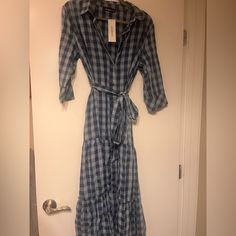 Blue Plaid Button Down Maxi Length Shirt Dress With Prairie-Style Skirt. Size Medium. Lightweight. Never Worn. Blue Cotton Shirt Dress With Button Closure, Blue Midi Dress With Button Closure For Beach, Light Blue Button-up Beach Dresses, Light Blue Button-up Cotton Shirt Dress, Light Blue Cotton Button-up Shirt Dress, Blue Button Closure Shirt Dress For Beach, Blue Beach Shirt Dress With Button Closure, Collared Blue Maxi Dress For Spring, Blue Button-up Midi Dress For Beach