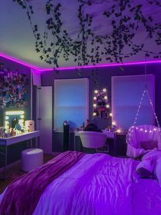 a bedroom with purple lighting and decorations