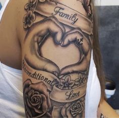 a woman with a tattoo on her arm that says family and two hands in the shape of a heart