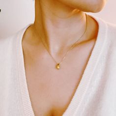 Stay stylishly understated with the Mini Teardrop Pendant Necklace! This small teardrop-shaped pendant is the perfect addition to any outfit, designed to be simple and chic. Elevate your look with this subtle yet statement-making piece! 16" with a 2" extender 18k gold plated stainless steel, water and tarnish resistant finish Lead and Nickel free Ethically sourced Made in China Dainty Teardrop Pendant Drop Necklace For Everyday, Modern Drop Necklace For Everyday, Delicate Teardrop Charm Necklaces For Everyday, Dainty Teardrop Charm Necklace, Minimalist Teardrop Pendant Drop Earrings For Everyday, Everyday Delicate Teardrop Charm Necklace, Dainty Teardrop Drop Necklace For Everyday, Dainty Teardrop Necklace For Everyday, Minimalist Teardrop Pendant Drop For Everyday