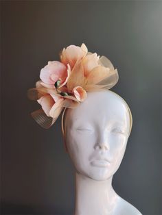 fascinator headpiece with elegant magnolia or orchid flowers on top of gold tulle, perfect for tea parties, derby events, and other special occasions! Thank you for supporting small businesses and we hope our products bring you and your loved ones Joy & Happiness! S H I P P I N G  -   Last minute masquerade mask shopping? 24 hr processing available. Pick appropriate shipping method and leave us checkout note! 1-2 day guaranteed delivery services also offered, add items to cart and click on shipping tab for rates.  Pls leave a check out note with your need date & contact number (especially for expedited and custom orders) Msg for delivery time frames (Include your state/country). S I Z E Adult size. Detailed dimensions are available upon request. C O N T A C T Text: 1-516-654-4643 Email: La Flower-shaped Party Fascinator With Flower Decoration, Whimsical Flower-shaped Fascinator With Handmade Flowers, Elegant Flower Headpieces For Spring, Spring Cream Mini Hat Headband, Elegant Flower Hair Accessories For Spring, Elegant Spring Flower Hair Accessories, Spring Formal Fascinator With Handmade Flowers, Elegant Adjustable Fascinator With Flower Decoration, Elegant Flower Mini Hat For Garden Party