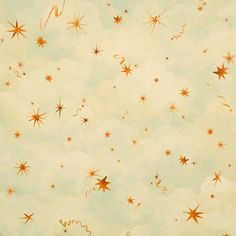 the sky is filled with gold stars on a pale blue and light green background for wallpaper