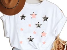 Casual T-shirt With Star Print For Spring, Spring Crew Neck T-shirt With Star Print, Summer Crew Neck T-shirt With Star Print, Relaxed Fit T-shirt With Star Print For Spring, Spring Relaxed Fit T-shirt With Star Print, Cute Short Sleeve T-shirt With Star Print, Pink Star Print Crew Neck T-shirt, Pink Crew Neck T-shirt With Star Print, White Star Print T-shirt For Spring