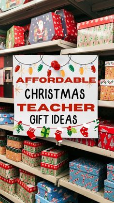 a christmas teacher gift idea sign in a store with lots of presents on the shelves