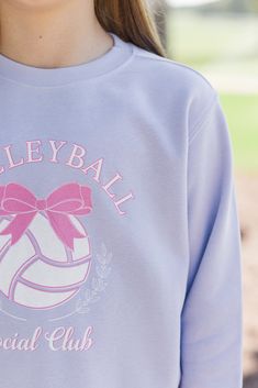 If your girl is into volleyball, then she will surely be into this sweatshirt! This adorable graphic sweatshirt is perfect going into the fall for all the volleyball girlies! It's going to look so good with athletic skorts! Crew neckline Long sleeves Volleyball graphic Generous stretch Morgan is wearing the small. Custom made-to-order. Please allow up to an additional 5-10 business days to process and ship your order. Sporty Letter Print Sweatshirt For Cheerleading, Sporty Graphic Print Sweatshirt For School, Purple Sporty Sweatshirt With Graphic Print, Lavender Graphic, Volleyball Team Hoodies, Volleyball Long Sleeve Shirts, Volleyball Crewneck Sweatshirt, Purple Crew Neck T-shirt For Sports, Volleyball Sweatshirts