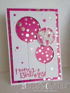 a happy birthday card with balloons and glitters on it's side, in pink and white