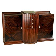 three pieces of art deco furniture are on display