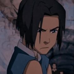 an anime character with black hair and blue shirt standing in front of a stone wall