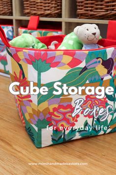 two storage baskets with stuffed animals in them on a wooden table and the words cube storage bags for everyday life