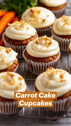 carrot cupcakes with cream cheese frosting and chopped carrots in the background