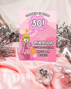 a pink and silver birthday card with a cartoon girl on it's front, surrounded by tinsel