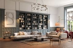 a living room filled with lots of furniture next to a large book shelf full of books