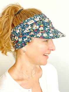 Cute Visor for Women "Love my new visor! It's really comfortable and stays in place. The shop owner is very helpful too! I just placed another order." - Sarah, WA A stylish visor that works and hard and is adorable Floral Visor for WomenMade to Order in color shown: 3-5 business days Suggested Sizes:Small: 19" - 21"Medium: 21" - 23"Large: 23"+ Think of this like a headband with a visor attached. It will stretch! If you're comfortable giving me your head size - that'd be great. I have a 23" head and wear the Medium. Let me know if you have questions with the contact button above. OVERVIEWCajole the wingers and get serious about your visor with an added dose of authentic fun. This new visor for women has got nothin' on your baseball cap, like for real. From catching the sweat during weed pul Adjustable Casual Visor For Golf, Casual Adjustable Visor For Golf, Adjustable Casual Golf Visor, Casual Brimmed Visor One Size Fits Most, Casual Brimmed Visor, Bucket Hat Winter, Winter Bucket Hat, Earflap Beanie, Bucket Hat Summer