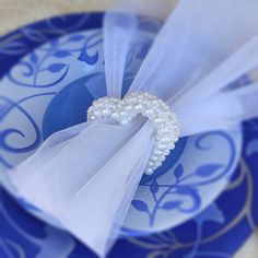 a blue and white plate topped with a napkin