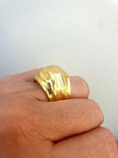 This is a beutifull 14 k gold plated brass, big noticeable ring. A rustic textured statement ring . it is a designer statement ring. A great gift for loved ones or for yourself. This stunning big 14 karat gold plated brass ring, is a very impressive piece. Its a chunky ring that makes a fashionable statement. The ring will look great with both casual & elegant wear. HANDMADE ITEM Materials: This ring is made of 14 karat gold plated brass. You can also choose between Sterling silver black oxi Handmade Thick Band Elegant Rings, Handmade Elegant Rings With Thick Band, Handmade Elegant Wide Band Open Ring, Elegant Handmade Wide Band Open Ring, Unique Gold Signet Ring With Polished Finish, Elegant Handmade Wide Band Yellow Gold Ring, Elegant Handmade Thick Band Wide Ring, Elegant Handmade Yellow Gold Wide Band Ring, Elegant Handmade Wide Band Ring In Yellow Gold