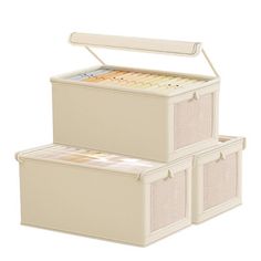 three storage boxes stacked on top of each other, one with lid open and the other closed