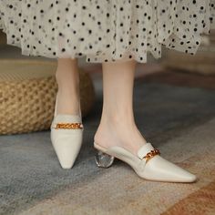 Chiko Iola Round Toe Block Heels Clogs/Mules White Mules With Contrasting Heel Counter And Closed Toe, White Mules With Contrasting Heel And Closed Toe, Chic Pointed Toe Clogs With Rubber Sole, White Closed Toe Mules With Contrasting Heel, Slip-on Mules With Wooden Flat Heel, Spring Low Heel Mules With Rubber Sole, Office Sandals With Sculpted Heel And Round Toe, White High Heel Mules For Work, Office Sandals With Reinforced Heel And Round Toe