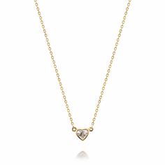 The ADDISON Solitaire bezel heart necklace features a 1/2ct. center stone in a classic bezel setting. Available in diamond option as well as semi-precious and precious birthstones. Style is custom made to order. Please allow 4-5 weeks for it to ship. Gold Necklaces With Single Diamond Heart Cut, Gold Necklace With Heart Cut Single Diamond, Gold Heart Cut Single Diamond Necklace, Heart Cut Gold Necklace With Single Diamond, Anniversary Heart Necklace With Bezel Setting, Anniversary Heart Pendant Necklace With Bezel Setting, Diamond Mirror, Formal Style, Bezel Setting