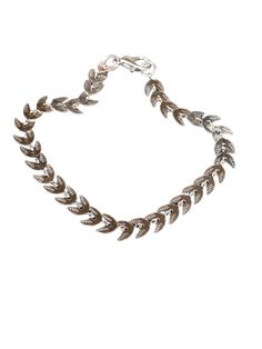 Introducing our stunning Laurel Bracelet! Crafted with a delicate silver leaf chain, this piece showcases a captivating design reminiscent of the leaves on a laurel wreath. Its unique charm leaves a lasting impression on anyone who wears it. Made with high-quality satin rhodium plating, this bracelet exudes an undeniable radiance. Whether you're attending a special occasion or simply adding a touch of sophistication to your everyday ensemble, our Laurel Bracelet is the perfect accessory to eleva Dainty Silver Metal Chain Bracelet, Nickel Free Silver Leaf Shaped Jewelry, Elegant Silver Leaf Jewelry, Adjustable Silver Leaf Jewelry, Silver Leaf-shaped Jewelry For Party, Dainty Nickel-free Silver Chain Bracelet, Elegant Adjustable Leaf-shaped Jewelry, Silver Laurel Crown, Silver Leaf-shaped Jewelry