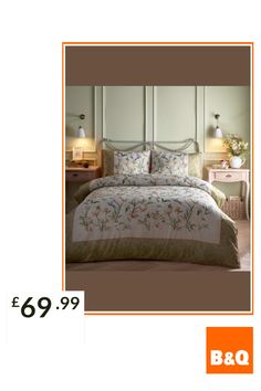 an advertisement for a bed in a bedroom with flowers on the comforter and pillows