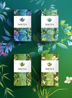 three packets of niktea tea on a green background with flowers and leaves around them