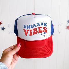 Looking for a cute versatile hat to wear this summer? Make sure to grab one of our American Vibes Wavy Stars Foam Trucker Hats! This fun anda comfortable hat is the perfect accesory for any outfit. The bright color adds a pop of summer to any outfit. These hats are adult one size fits most. Patriotic White Hat For Summer, Trendy Cap For 4th Of July, 4th Of July Beach Cap, Summer Multicolor Hats With Letter Print, Multicolor Summer Hats With Letter Print, Multicolor Letter Print Summer Hat, Summer Multicolor Letter Print Hats, 4th Of July Casual Trucker Hat, Summer Red Baseball Cap With Letter Print