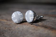 These subtle grey union jack cufflinks create the alternative to the classic red white and blue. These cufflinks are set on a shiny silver setting and measure 2cm across. They are subtle and stunning. You will receive them in a cufflink box and gift wrapped. 3rd Wedding Anniversary, Cufflink Box, Wedding Bottles, 3rd Anniversary Gifts, Leather Coasters, Personalized Anniversary Gifts, Stocking Filler Gifts, Tie Clips, Leather Gifts