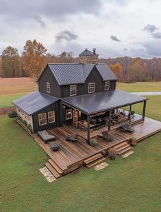 an aerial view of a house with a covered deck