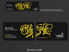 two business cards with yellow graffiti on them, one is black and the other is white