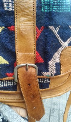 "Welcome! A kilim shoulder bag Material: leather Some signs of use (some stain, imperfecto on and small hole un strap that needs sew) but in good condition. Interior needs some restauration. Strong Material. Really good quality leather. Adjustable Straps. Measures: 11.41\" (29 cm) x 9.05\" (23 cm) Straps: 45.66\" (116 cm) Thanks for stopping by!!IMPORTANT: Due to the delicate situation We're all going through, and in order to keep the safety of courier workers too, all orders will be dispatched Bohemian Leather Saddle Bag With Leather Handles, Bohemian Saddle Shoulder Bag For Travel, Bohemian Shoulder Bag With Leather Trim, Bohemian Saddle Bag With Leather Handles For Everyday Use, Bohemian Saddle Bag With Adjustable Strap, Bohemian Satchel Saddle Bag For Travel, Bohemian Satchel Saddle Bag For Daily Use, Brown Bohemian Saddle Bag For Travel, Bohemian Saddle Bag Satchel With Adjustable Strap