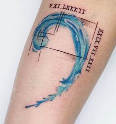 a close up of a person's arm with a blue wave tattoo on it