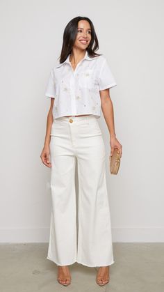 Elevate your casual look with these white wide leg pants. The sleek white hue adds versatility, allowing for easy pairing with both casual tees or dressier tops for a chic ensemble. With their smooth satin finish, these pants offer a perfect balance of style and practicality for any occasion. Features: White Wide Leg Pants 81544 P2-2-2 White Cotton Wide Leg Pants For Summer, White Wide Leg Summer Pants With Pockets, White High-waisted Wide Leg Cotton Pants, White Cotton Wide Leg Pants For Day Out, White High-waisted Cotton Wide Leg Pants, White Wide Leg Bottoms For Day Out, Elegant White Cropped Bottoms, White Cropped Cotton Bottoms, White Relaxed Fit Wide Leg Pants For Work