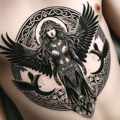 a woman's back with an intricate tattoo design on her stomach and the image of a bird