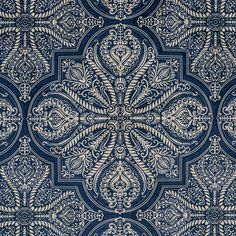 a blue and white wallpaper with an intricate design on it's surface,