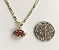 "14K SOLID GOLD RED EVIL EYE NECKLACE . 20\"LONG FIGARO CHAIN. REAL 14K GOLD (NOT PLATED OR FILLED).-- 2. GR--FOR GOOD LUCK AND PROTECTION PENDANT SIZE : 13 mm X 13 mm ---MADE IN ITALY-BEST QUALITY--- FREE GIFT BOX NOTE:THIS ITEM IS SHIPPED WITH SIGNATURE CONFIRMATION. CADENA DE OJO DE LA BUENA SUERTE EN ORO PURO 14K. 20\" LARGO FIGARO CADENA. COLOR ROJO .--2. GR-- PARA BUENA SUERTE Y PROTECCIÓN DIJE: 13 mm X 13 mm ---MEJOR CALIDAD-HECHO EN ITALIA--- CAJA DE REGALO GRATIS NOTA:ESTE ARTICULO SERA Red Gold-plated Necklaces With Lobster Clasp, Red Gold-plated Necklace With Lobster Clasp, Red Tarnish Resistant Necklace As Gift, Red Tarnish Resistant Necklace For Gift, Red Tarnish-resistant Pendant Jewelry, Red 14k Gold Pendant Necklaces, Red Gold Plated Necklace, Red Gold-plated Tarnish-resistant Necklace, Red Tarnish-resistant Gold-plated Necklace