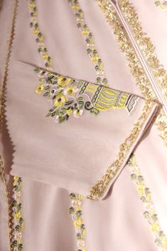 This beautiful three piece is designed on cotton net in a dreamy pastel tea pink hue with pretty intricate gold hand zardosi craftmenship, featuring pretty hand embroidered trellis. Paired with a regal matching pure organza dupatta alongside lacey matching pencil trousers. The length of the panelled pishwas is 50 inche Elegant Pink Unstitched Suit With Dabka, Elegant Pink Dabka Unstitched Suit, Elegant Pink Lawn Suit With Chikankari Embroidery, Elegant Pink Dupatta With Dabka, Elegant Pink Unstitched Suit With Intricate Embroidery, Elegant Pink Embroidered Lawn Suit, Elegant Pink Anarkali Set With Dabka Details, Elegant Pink Anarkali Set With Dabka, Elegant Pink Unstitched Embroidered Fabric