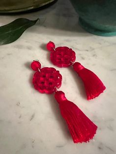 This ultralightweight Earring with a charming tassel is the perfect true red addition to your Earring collection! Pierced post Red Tasseled Jewelry As A Gift, Red Tasseled Jewelry For Gift, Red Dangle Tassel Earrings As Gift, Red Dangle Tassel Earrings For Gift, Red Tassel Earrings For Gift, Red Tassel Drop Earrings Gift, Red Tassel Earrings With Latkans As Gift, Red Tassel Earrings With Latkans For Gifts, Red Latkans Tassel Earrings For Gifts