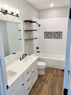 the bathroom is clean and ready to be used as a family room or office space