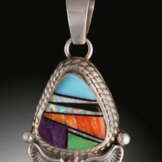 Turquoise, Onyx, Cultured Opal, Spiney Oyster, Sugelite, And Gaspiate Nestled Together In An Inlay Style Pendant. The Stones Have Been Bezel Set In Sterling Silver With Some Decorative Elements Along The Side And Bottom. Stamped With The Artists Initials On The Backside. Nation: Navajo Artist: T.F. Size: ~1-3/8" Long (Including Bail) X 7/8" Wide More Information Lapidary And Silversmithing Is An Important Way Of Life For The Navajo People. Starting In The 19th Century, A Man Named Atsidi Sani (1 White Topaz Earrings, Twisted Band Ring, Zuni Jewelry, Animal Earrings, Garnet Earrings, Gold Necklace Women, Topaz Earrings, Decorative Elements, Amethyst Earrings