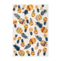 a rug with pineapples on it