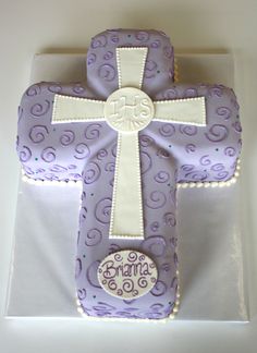 a cake that is shaped like a cross