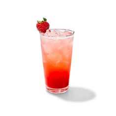 a red drink with ice and a strawberry on the rim, sitting in front of a white background