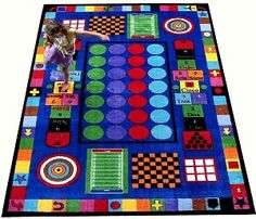 a colorful area rug with various shapes and sizes