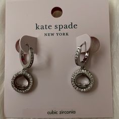 Kate Spade Spot The Spade Pave Huggie Earrings *New With Tags *Silver-Tone Pave Huggie Earrings *Silver-Tone Pave Spot The Spade Round Drop Charm *Approximate Dimensions: 1" In Length *Includes Kate Spade Dust Bag Kate Spade Silver Wedding Jewelry, Silver Kate Spade Earrings Gift, Kate Spade Drop Earrings As Gift, Kate Spade Silver Formal Jewelry, Kate Spade Silver Jewelry For Formal Occasions, Kate Spade Dangle Earrings As A Gift, Kate Spade Dangle Earrings For Gifts, Huggie Earrings Silver, Spade Jewelry