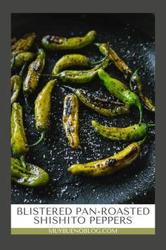 the finished pan - roasted shishito peppers in a skillet with text overlay