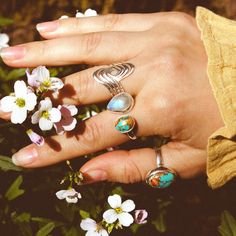 Inspired by the ocean's waves, this sterling silver statement ring invokes the wisdom of water. This silver beauty is perfect for any boho woman who loves the beach or simply wants to add some sparkling silver to her jewelry collection! Plus, this ring is so comfortable it feels like a hug for our finger! Material: Genuine Sterling Silver 92.5 Ring size: Choose your size Length/wide: 23mm Condition: Brand new Bohemian Stackable Jewelry For The Beach, Bohemian Stackable Beach Jewelry, Bohemian Beach Stackable Jewelry, Bohemian Stackable Summer Jewelry, Beach Toe Ring Jewelry, Adjustable Silver Rings With Ocean-inspired Style, Silver Stackable Jewelry For Beach, Adjustable Turquoise Ring In Sterling Silver For Healing, Adjustable Silver Turquoise Ring For Healing