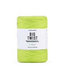 the yarn ball is bright yellow and has a white tag on it that says, big twist