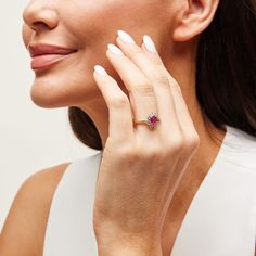 a close up of a person wearing a ring