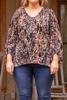 Everyone will love this trendy new top! This top has a fun floral print with dark winter colors you can style for every occasion! It's comfortable for all day wear, has a figure-flattering fit, and features the cutest balloon sleeves! Simply pair this top with skinnies and booties for an effortlessly chic look! 95% Polyester, 5% Spandex Floral Print Design, Chic Top, Model Fits, New Top, Winter Colors, Balloon Sleeves, Floral Top, The Cutest, The Hamptons